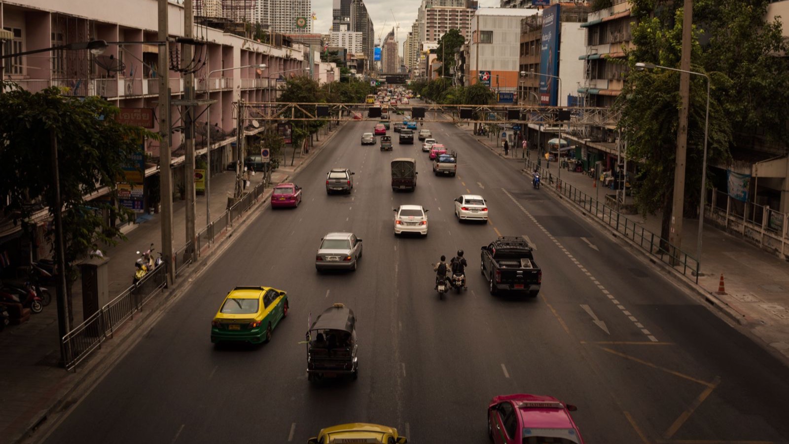 Urban road corridor with traffic flow representing intelligent transportation systems monitoring